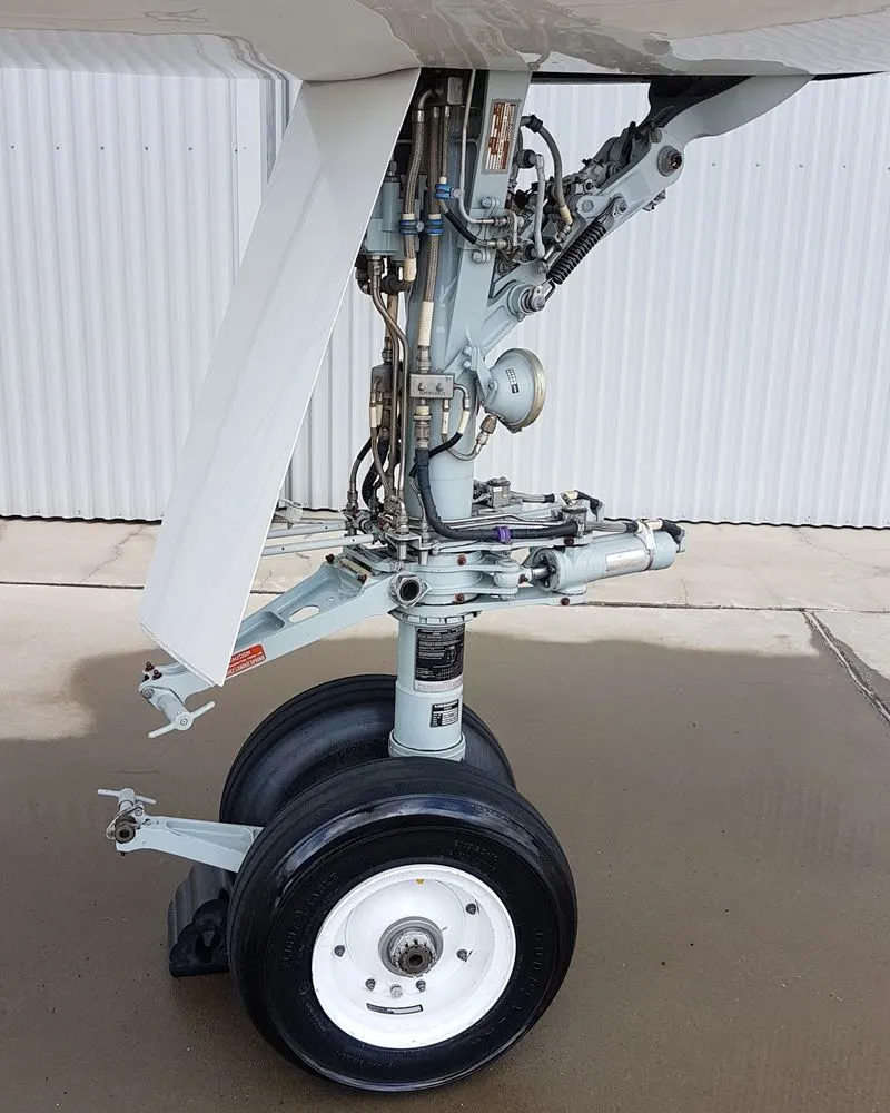 Clean nose landing gear assembly after degreasing